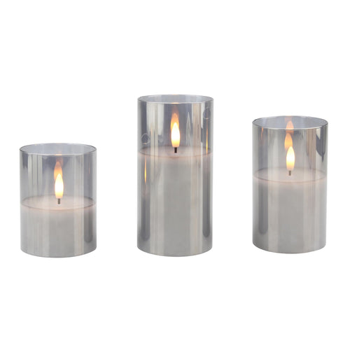 Stonebriar 3-pack real-wax flameless LED pillar candles in glass hurricanes, with remote and timer