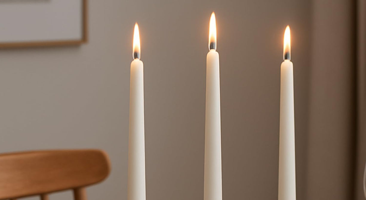 Stonebriar lit ivory taper candles - hero