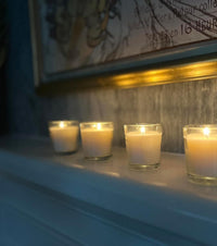 Stonebriar 48 Pack Unscented Long Burning Clear Glass Ivory Wax Filled Votive Candles (WS)