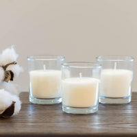 Stonebriar 48 Pack Unscented Long Burning Clear Glass Ivory Wax Filled Votive Candles (WS)
