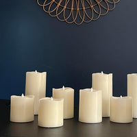 Stonebriar 6 Count Ivory Real Wax 3x8 Flameless LED Pillar Candles with Remote and Timer (WS)