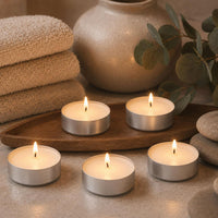Aluminum-cup tealights in a calm spa setting