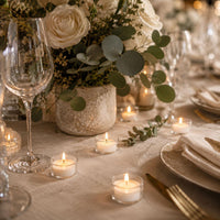 Clear-cup tealights on a wedding tablescape