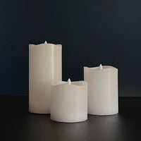 Stonebriar 3-pack white real-wax flameless LED pillar candles, assorted sizes, with remote and timer
