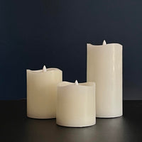 Stonebriar 3-pack ivory real-wax flameless LED pillar candles, assorted sizes, with remote and timer
