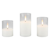 Stonebriar 3-pack real-wax flameless LED pillar candles in clear glass hurricanes, with remote and timer
