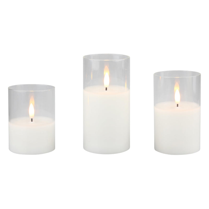 Stonebriar 3-pack real-wax flameless LED pillar candles in clear glass hurricanes, with remote and timer