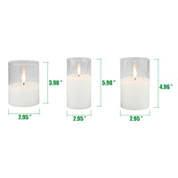 Stonebriar 3-pack real-wax flameless LED pillar candles in clear glass hurricanes, with remote and timer
