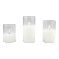 Stonebriar 3-pack real-wax flameless LED pillar candles in clear glass hurricanes, with remote and timer