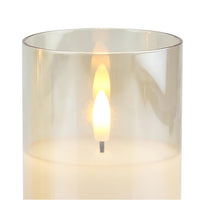 Stonebriar 3-pack real-wax flameless LED pillar candles in gold glass hurricanes, with remote and timer