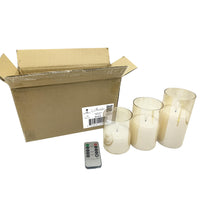 Stonebriar 3-pack real-wax flameless LED pillar candles in gold glass hurricanes, with remote and timer